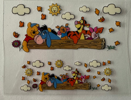 Uvdtf wraps Mini Stanley Winnie the Pooh sitting on a log