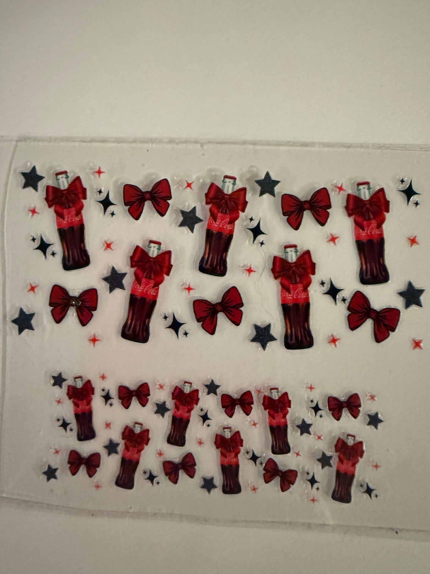Uvdtf wraps Mini Stanley Coke bottles with bows and stars