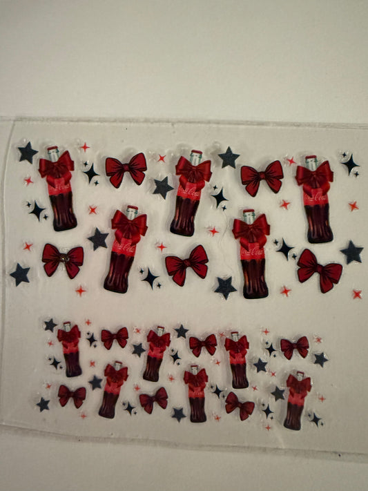 Uvdtf wraps Mini Stanley Coke bottles with bows and stars