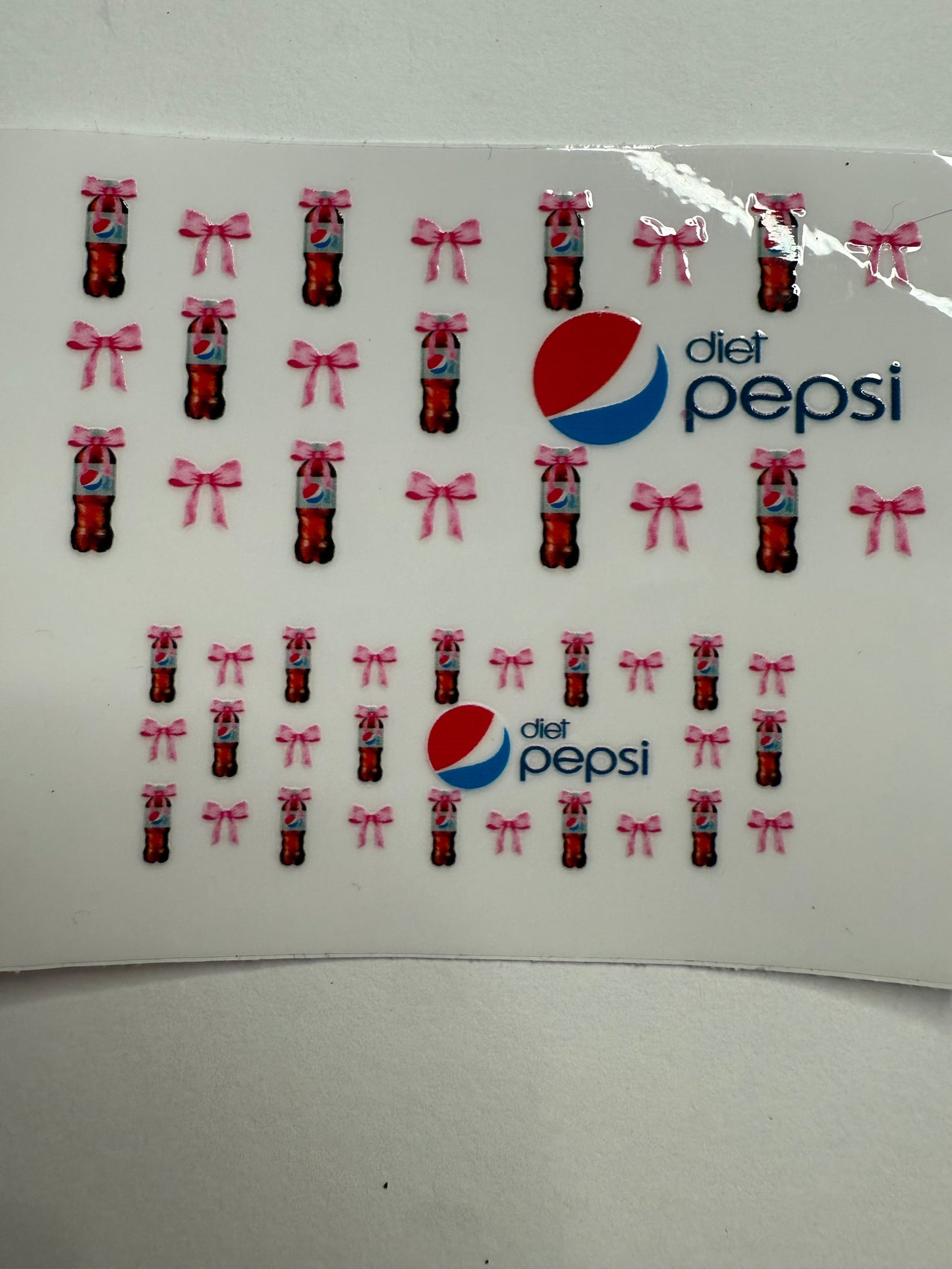 Uvdtf wraps Mini Stanley Diet Pepsi sodas with pink bow